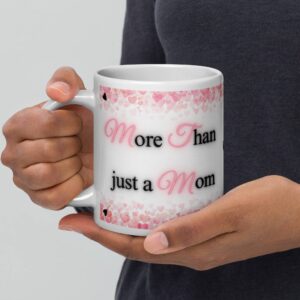 Coffee cup for mom that says More Than just a Mom with pink and black heart.