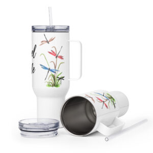 Dragonfly Travel Tumbler with colorful pink and blue dragon flies on grass with the caption Travel Mode.